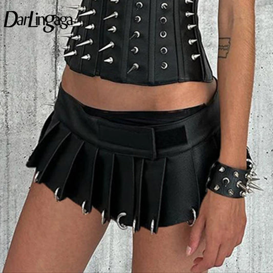 Darlingaga Streetwear Punk Gothic PU Leather Skirt Low Waisted Metal Ring Fashion Hot Party Mini Pleated Skirt Women Club Short